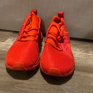 Puma red tennis shoes